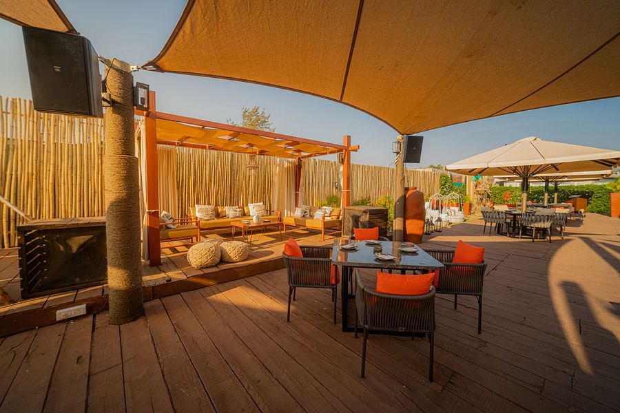 alt-text image of a restaurant designed with wooden interior with posh decor