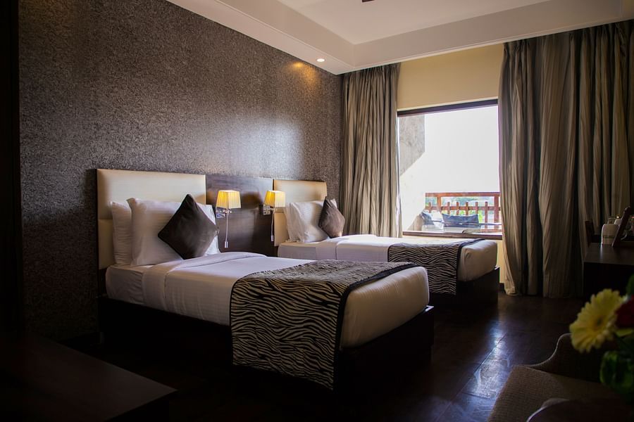Twin room with plush beds