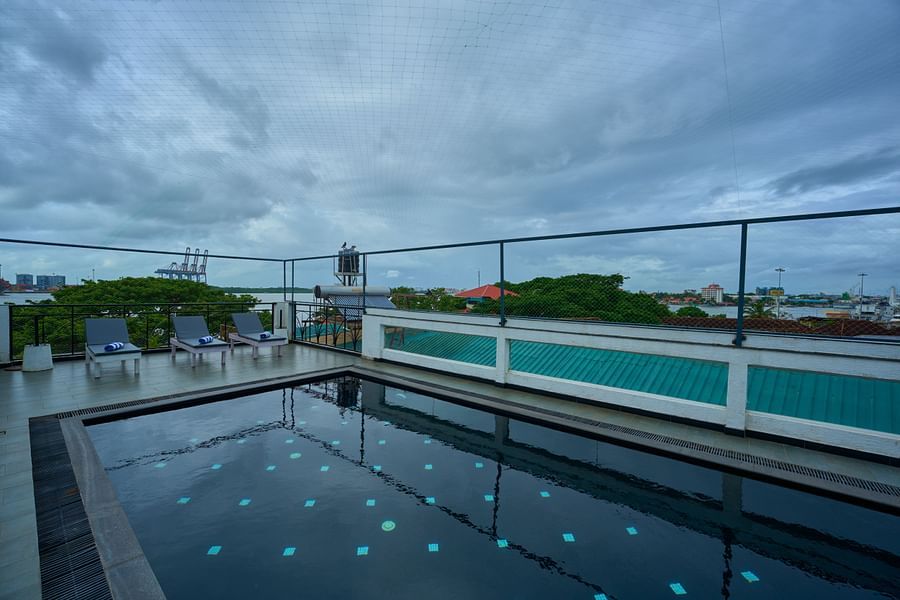 image of the pool at the old court house by abad, fort kochi
