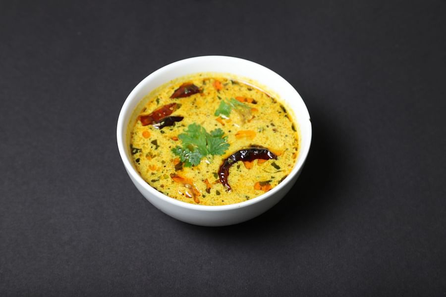 An image of a paneer dish with hot oil, coriander, and chilly in a restaurant at Five Element Hotel,  Jodhpur