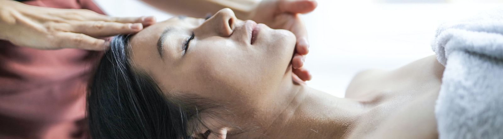 An image of a spa where a woman is getting a spa treatment