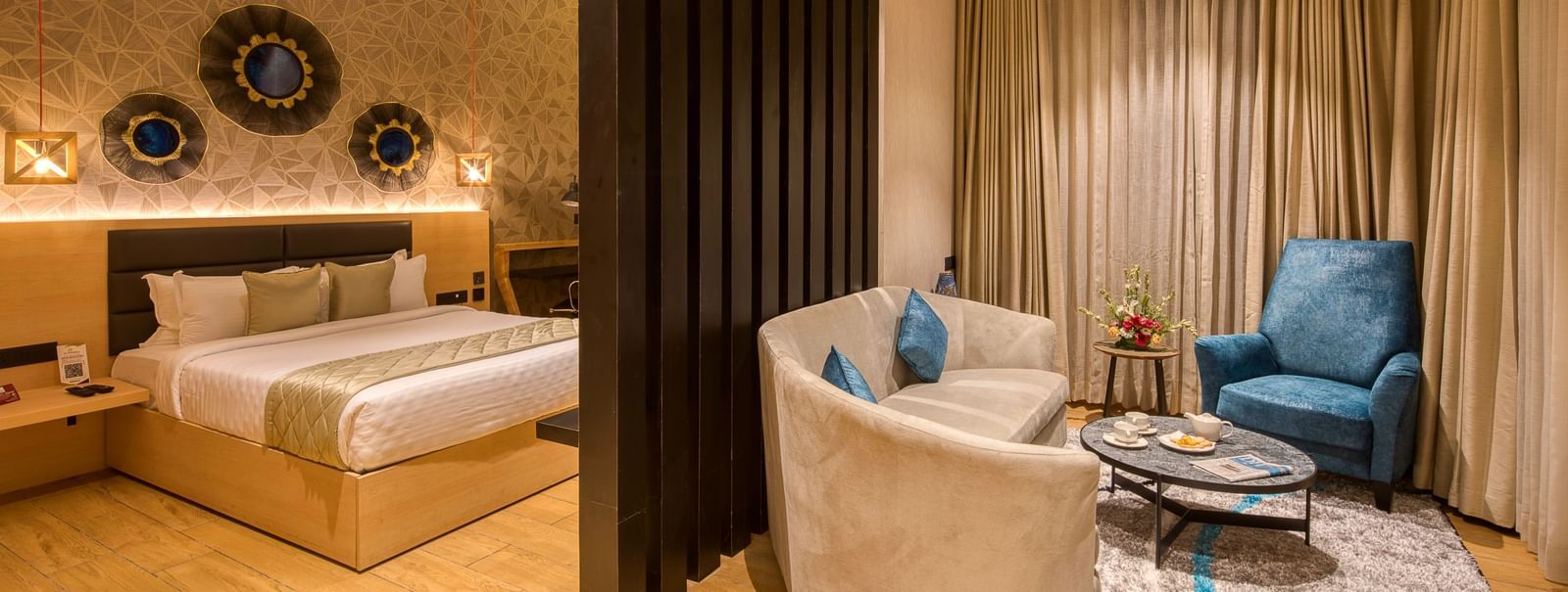 Double bed and the living area in the Sumo Suite at Le Foliage by TGI, Bangalore