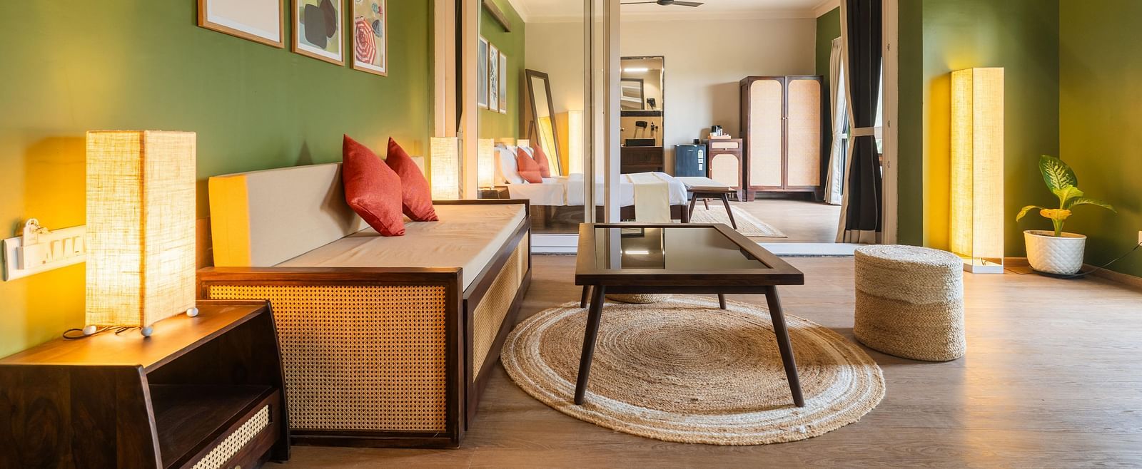 Open-plan suite with a cosy lounge, ambient lighting, and curated decor at Kssemya.