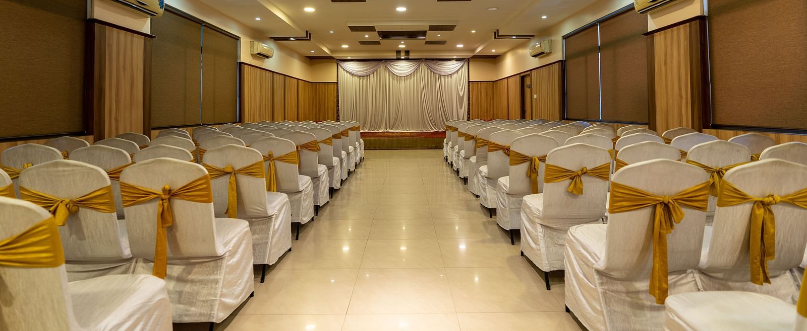 Seating arrangements inside a banquet hall - Hotel Pai Vista, KR Road