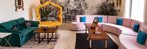 An overview of the living room inside Presidential Villa - Karma Lakelands.