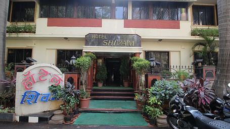 Facade view of Hotel Shivam, Pune in morning