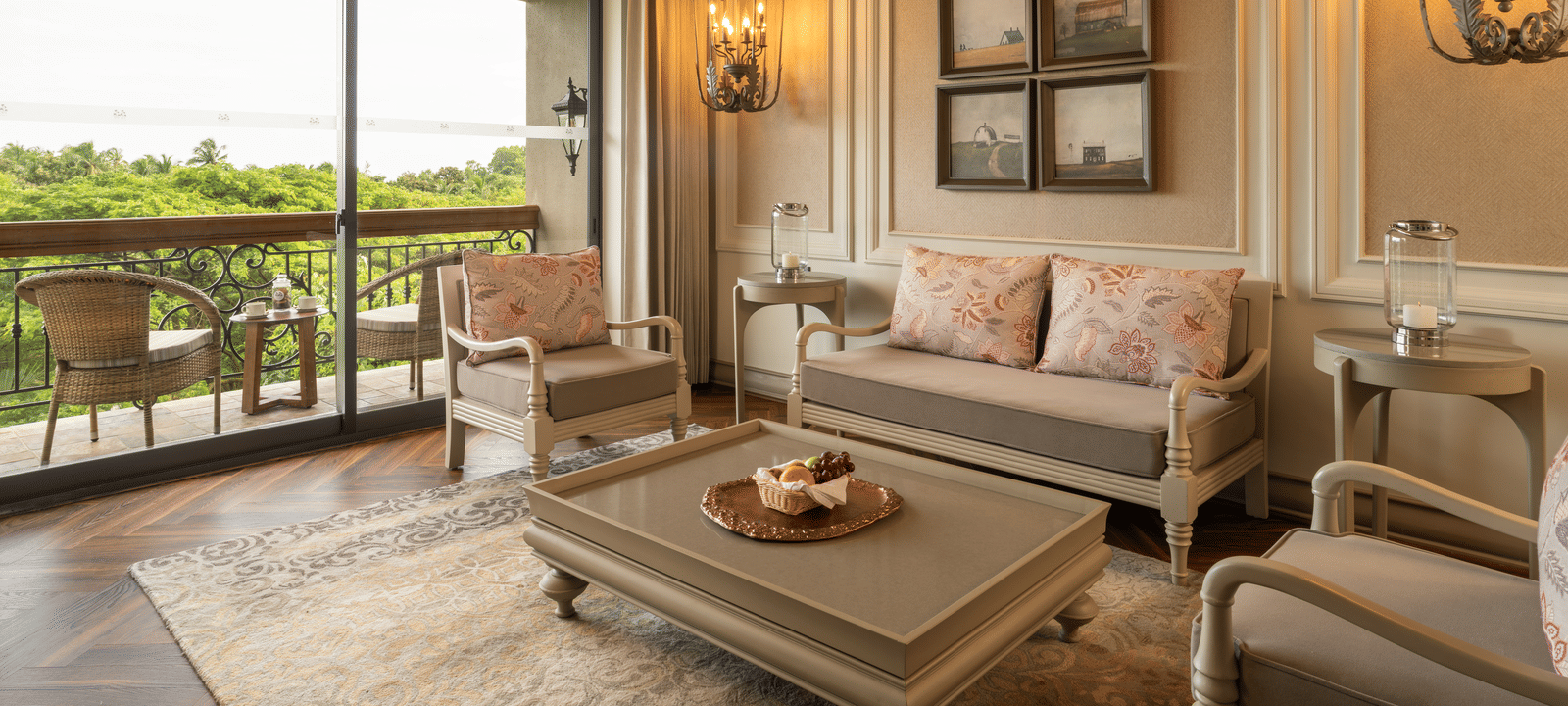 Full view of the living room of the Evren Suite with a balcony beside it at The Evren, Vagator.