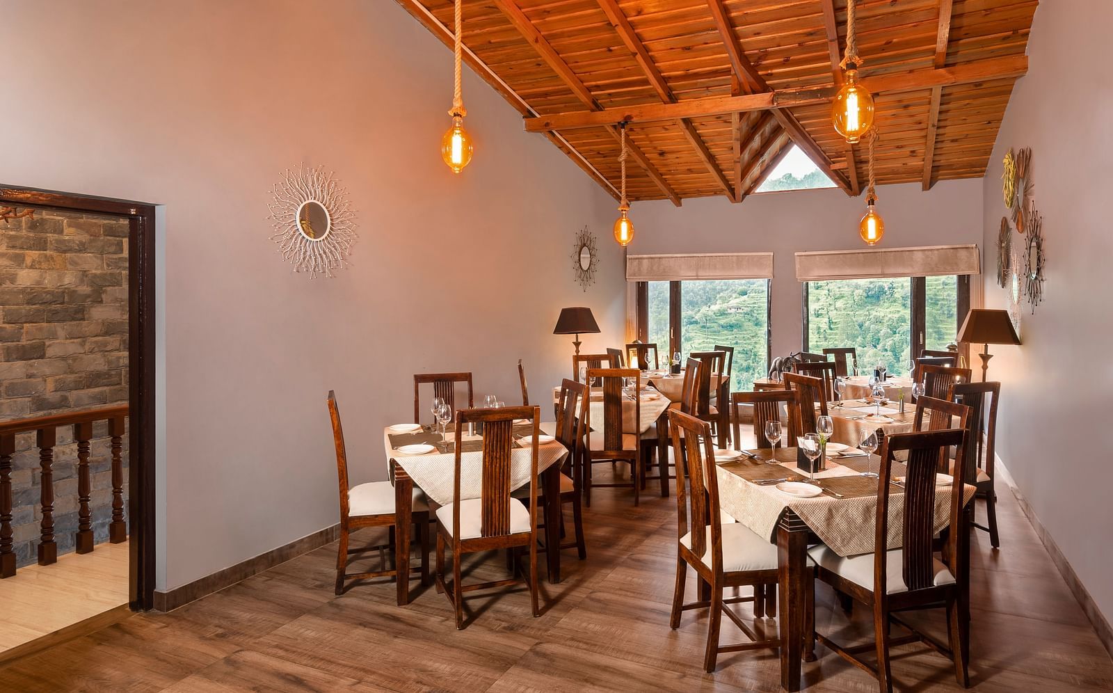 The Diner Restaurant with wooden ceiling and wooden furniture at Suvaasa, Ramgah
