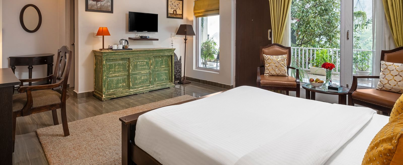 Bright and elegant guest room with large windows, wooden furniture, and modern decor, at BluSalzz Collection - Suvaasa Resort, Ramgarh.