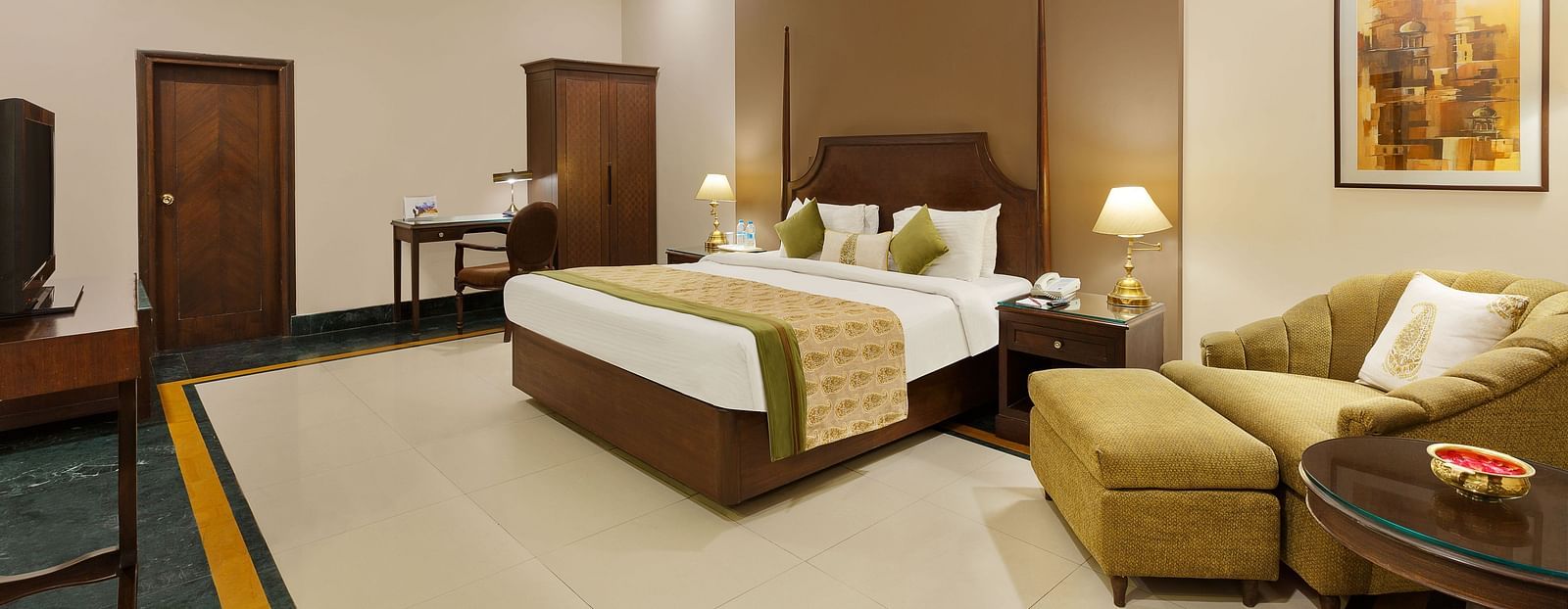 A luxurious king-size bed room with a view at Ganga Lahari Haridwar.