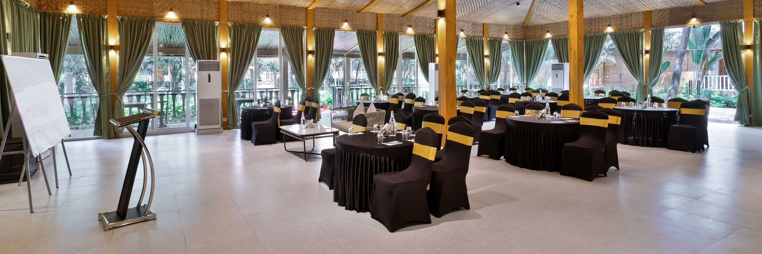 Banquet hall with serene interior decoration at Aralea Beach Resort by Stone Wood, Morjim