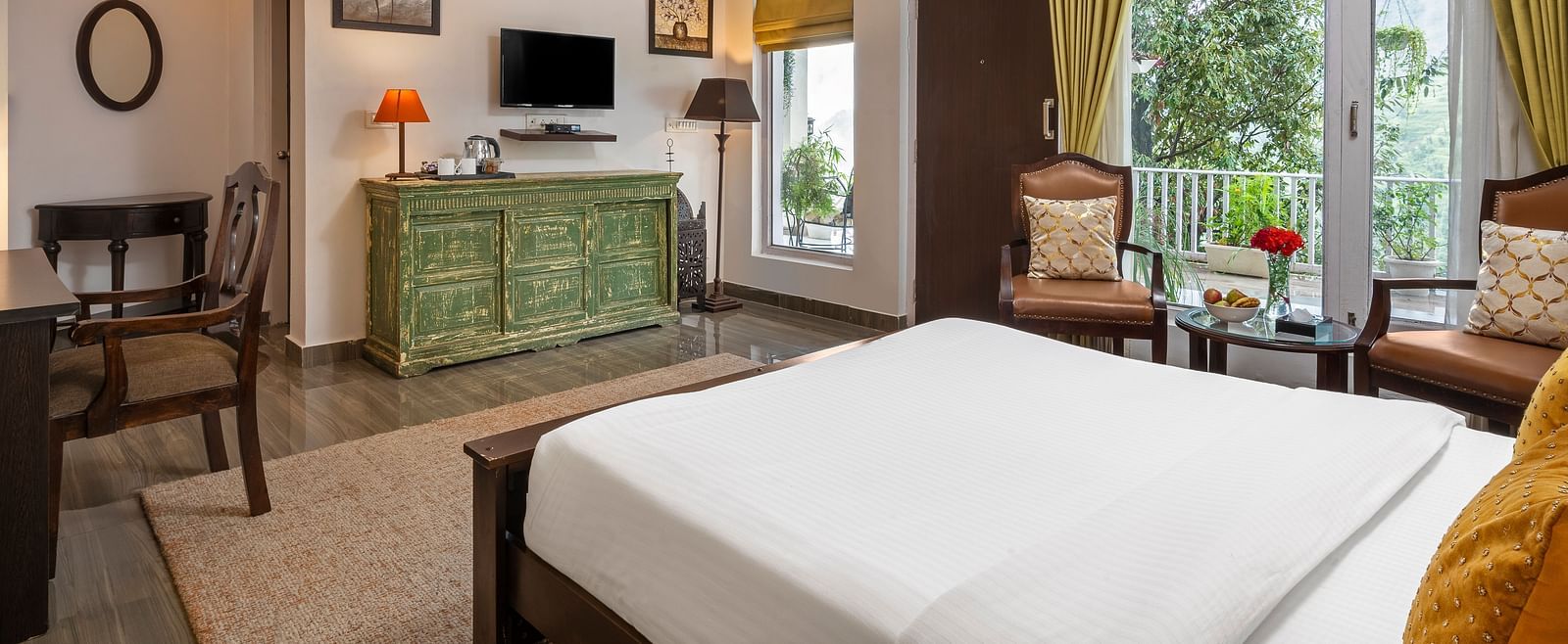 Bright and elegant guest room with large windows, wooden furniture, and modern decor, at BluSalzz Collection - Suvaasa Resort, Ramgarh.
