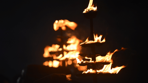 a prayer lamp lit to perform aarti