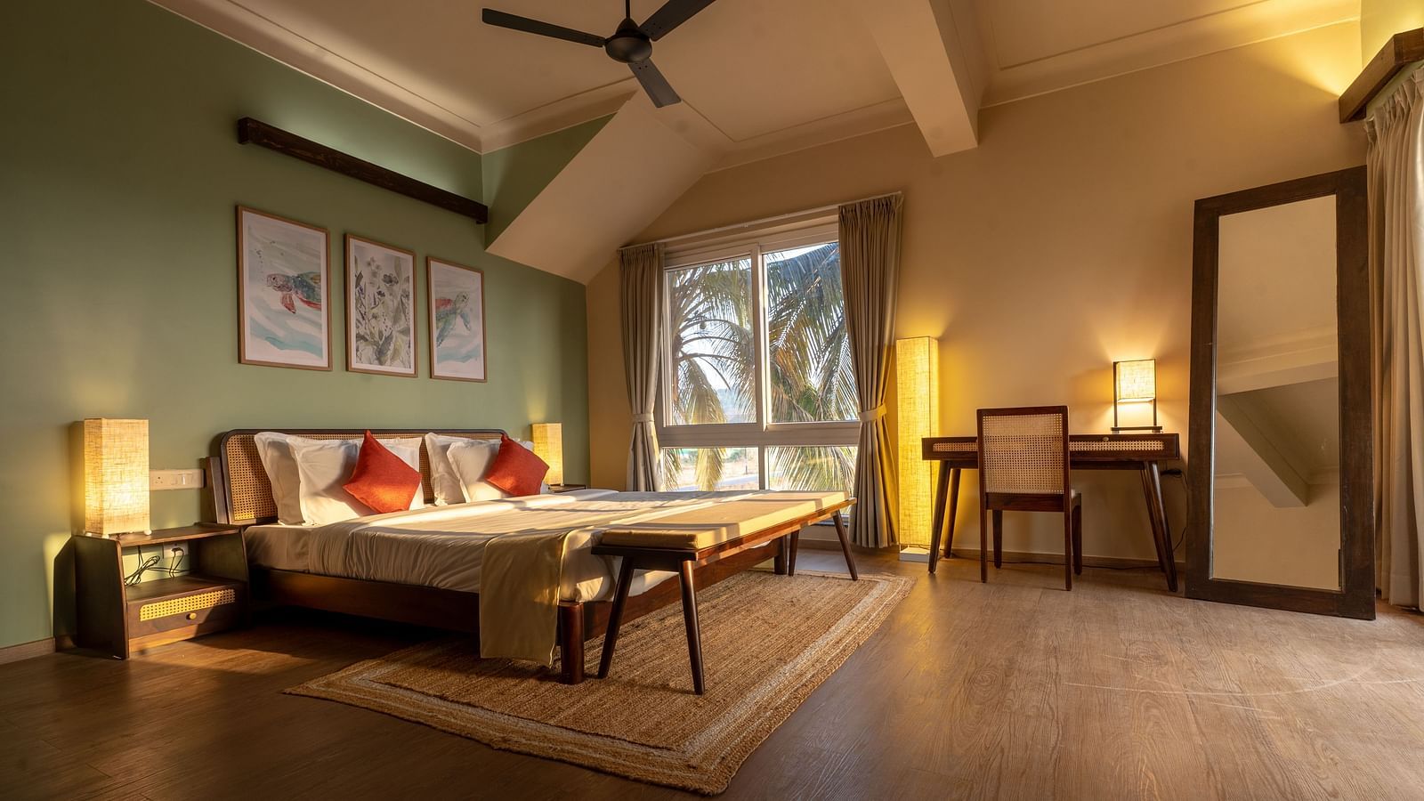 Spacious bedroom with cosy lighting, artwork, and natural wooden elements at Kssemya.