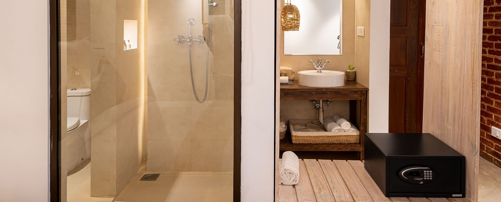A washroom featuring the shower area and the wash area - The Nanee