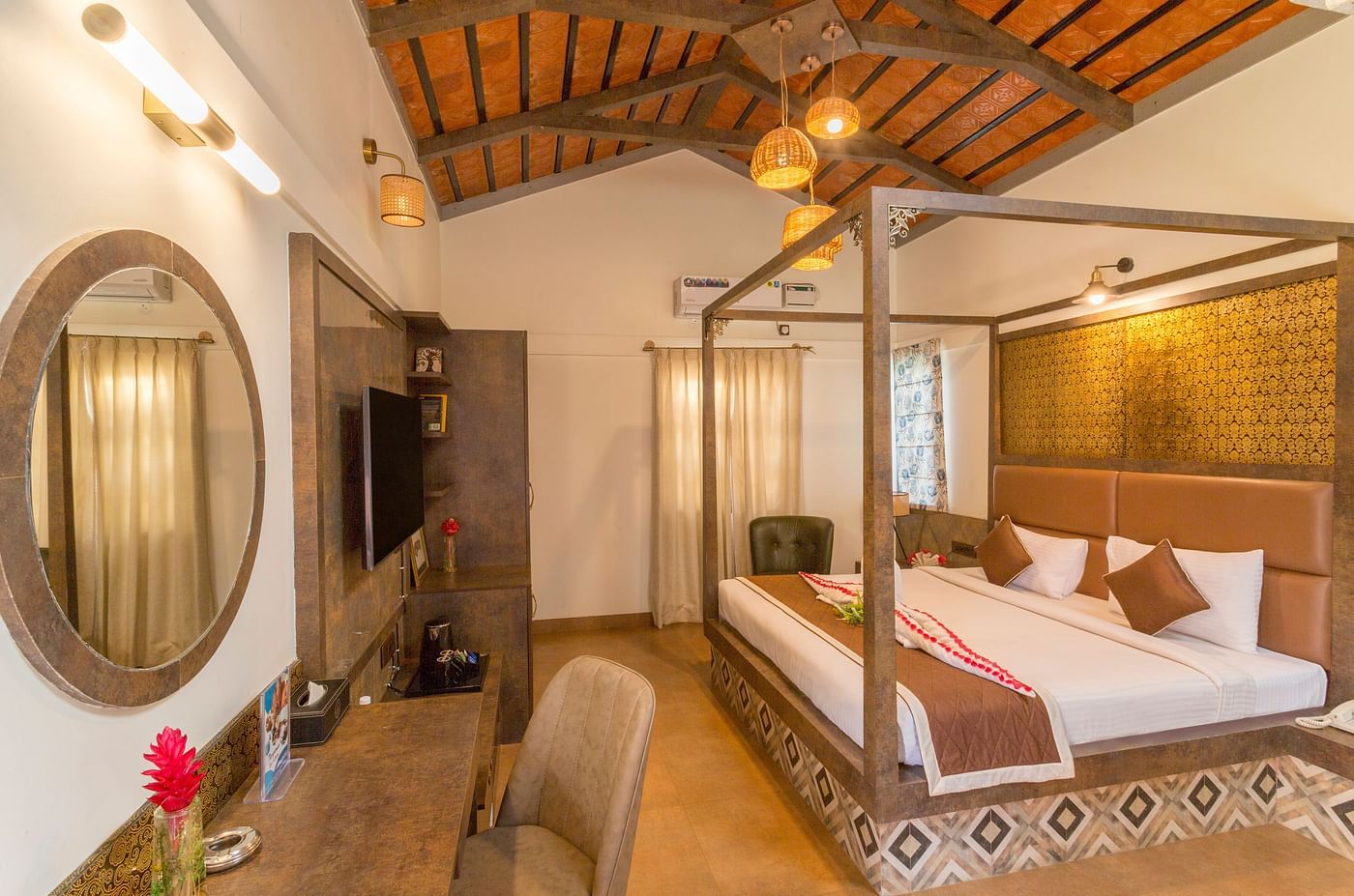 Premium room with traditional decor and cosy ambience at Nirantara Resort