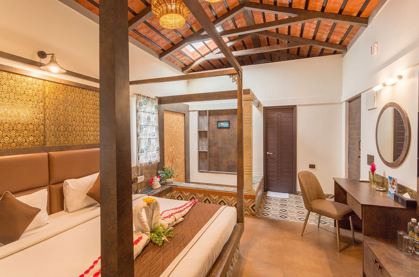 Luxurious bedroom with four poster bed and wooden ceiling at Nirantara Resort