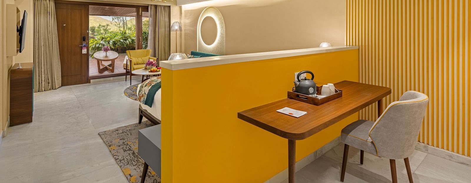 An image of a room with a small sitting area is visible with a coffee table and a sofa. 