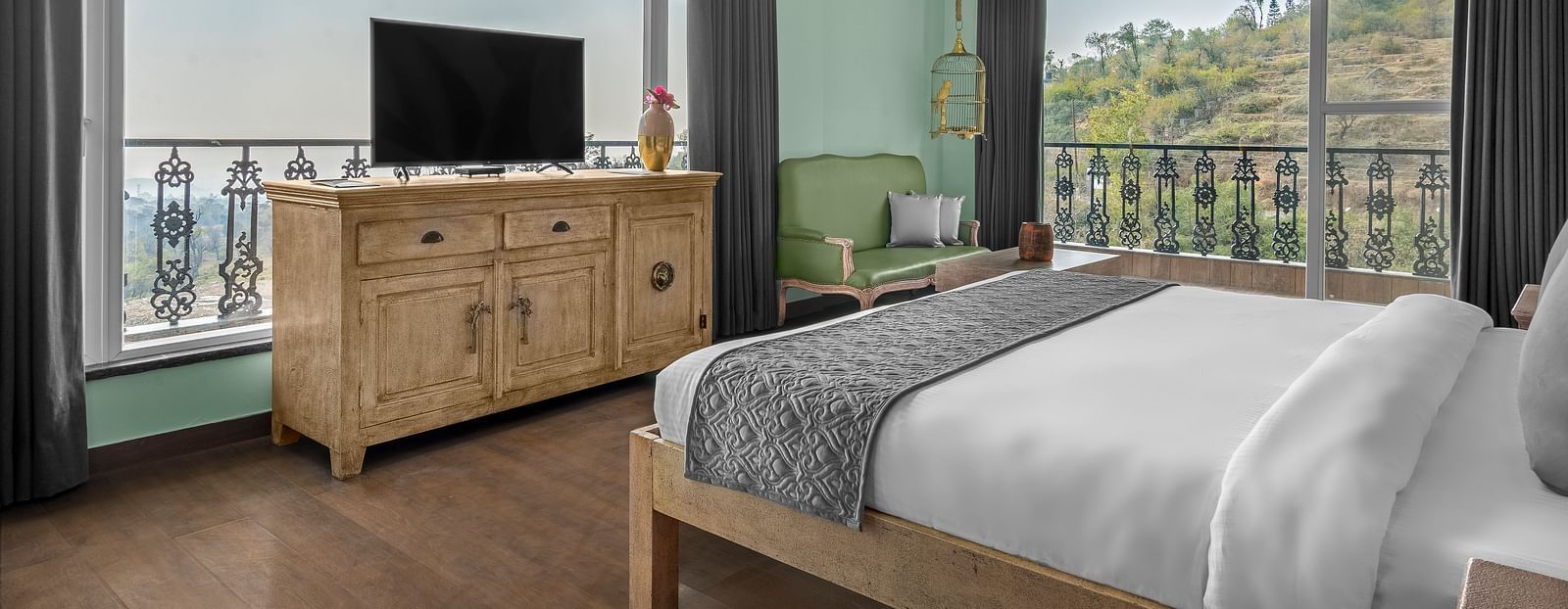 An image of Bedroom with a comfortable bed, a balcony, and a view of the outdoors - atman, dharamshala