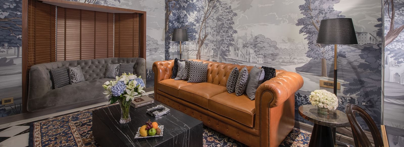 heritage Luxury Suite with sofas, lamp and a coffee table in the centre The Claridges, New Delhi
