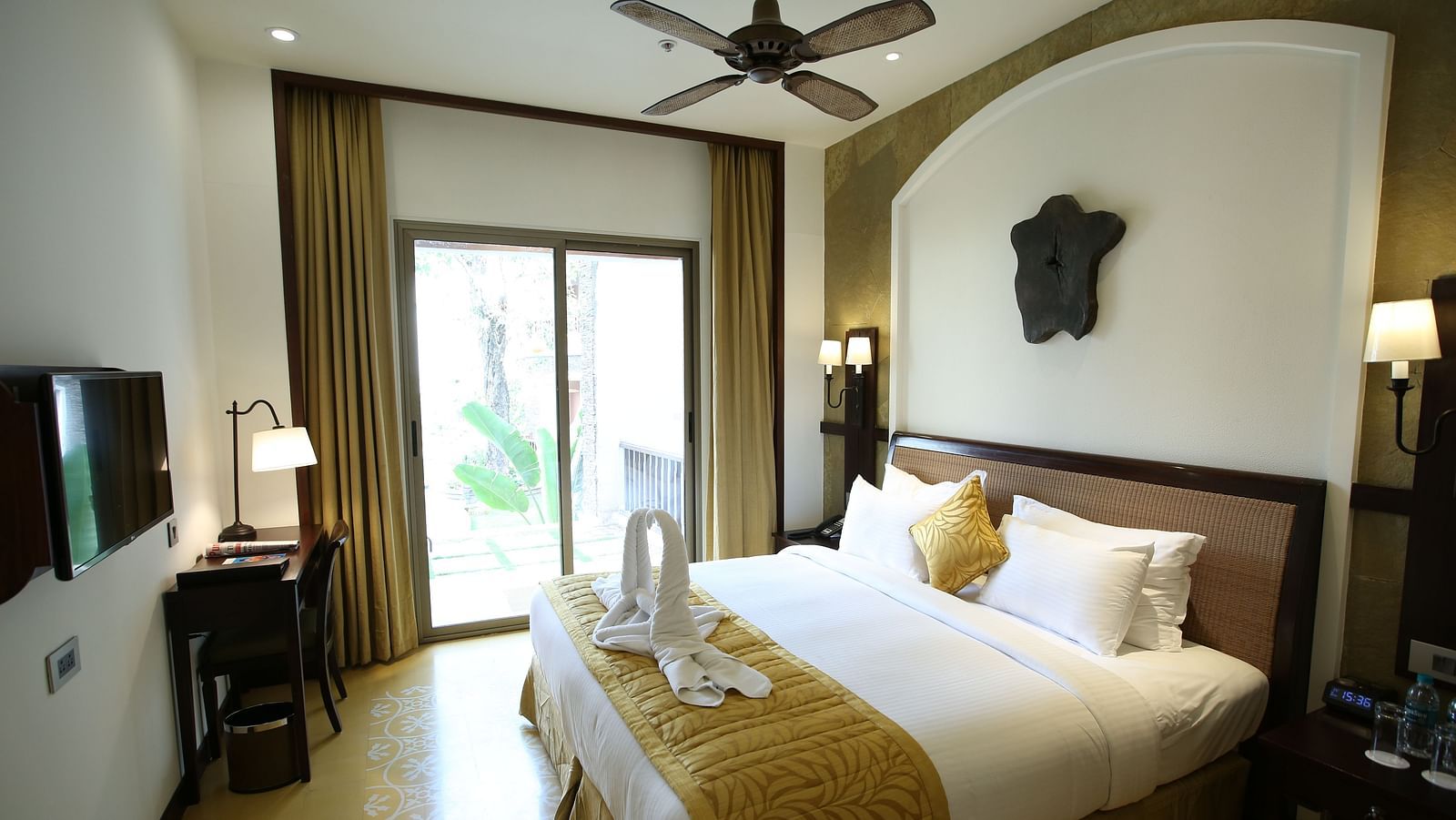 an image of a room with a patio door for a view - Rhythm Lonavala