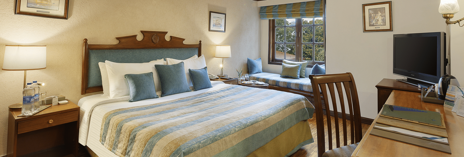 Hotel room with a king-size bed.