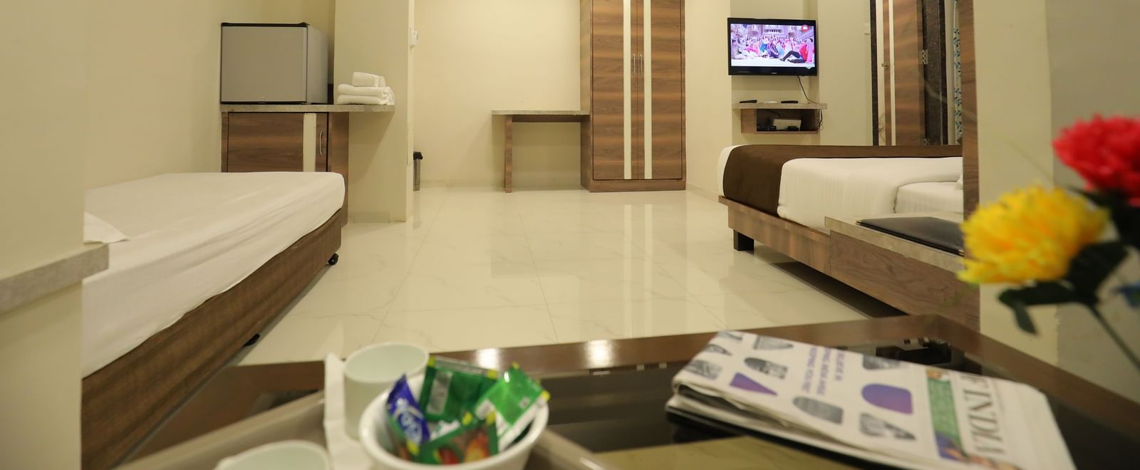 The well-lit Suite at Highland Resort features a wardrobe, a tea & coffee maker, air-conditioning, a minibar, a king size bed, and a single bed.