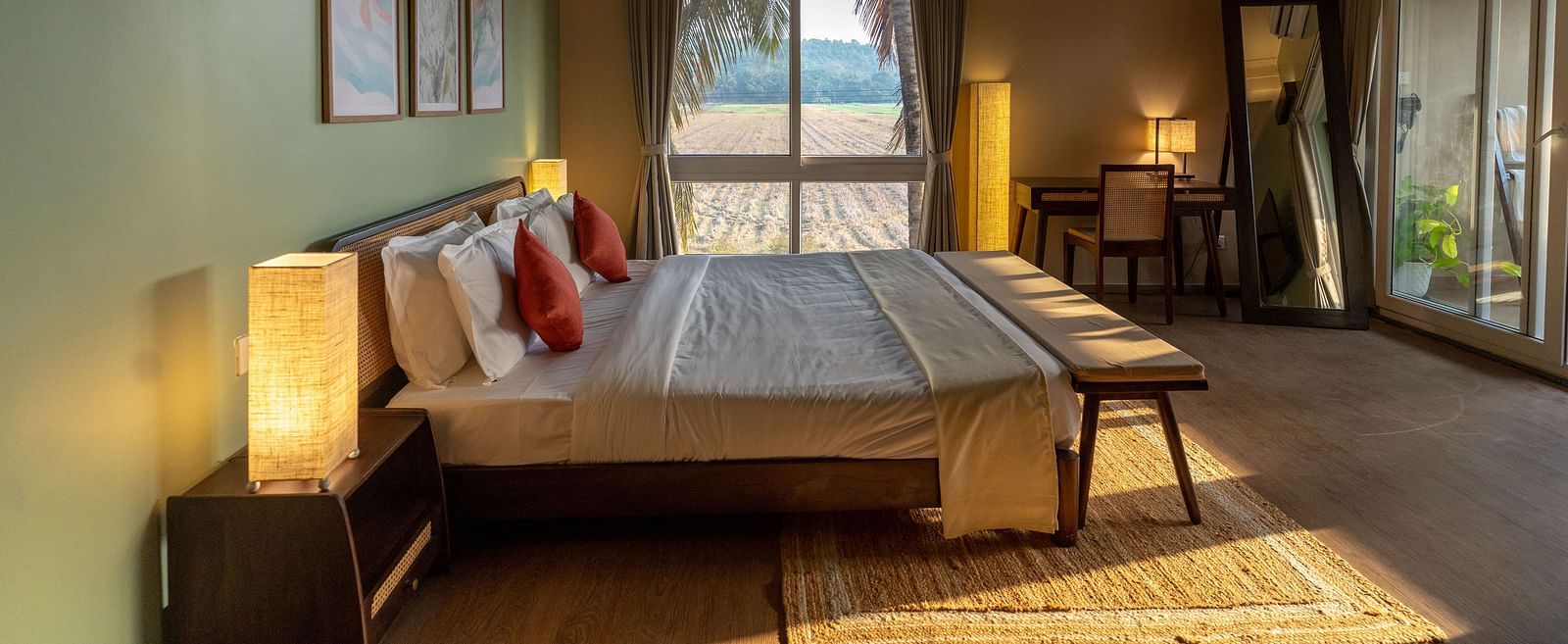 Elegant room featuring king size bed, modern furniture, and calming green interiors at Kssemya.