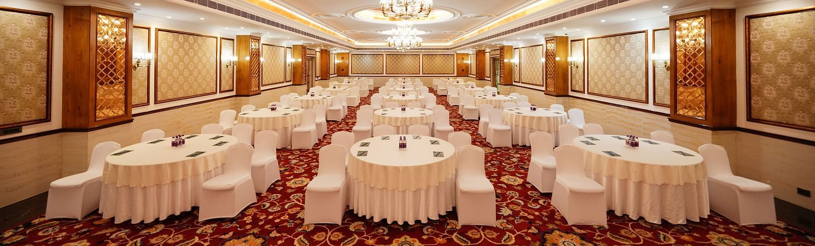 indoor seating space at a banquet hall - Mayfair Tea Resort, Siliguri 5