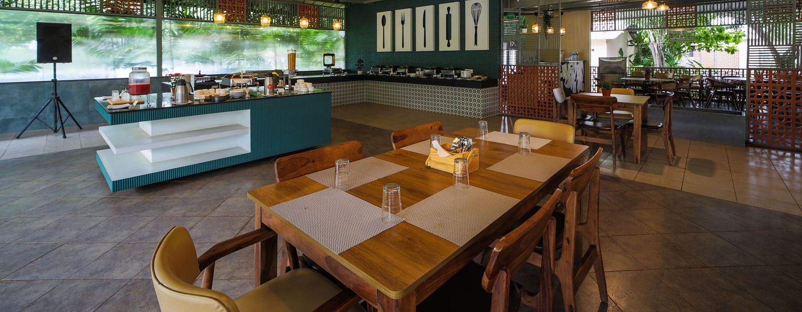 An image of the dining area with open wall arrangement - Trance Veechika Resort, Vikarabad