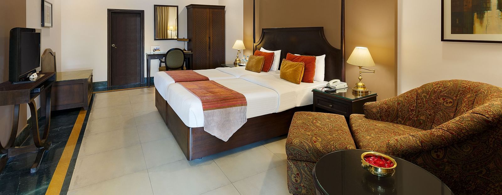 Spacious king-size bed room with a scenic view at Ganga Lahari Haridwar.