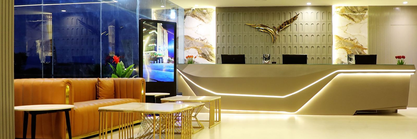 Lobby lounge at Town Square Suites with comfortable seating and sleek modern interiors