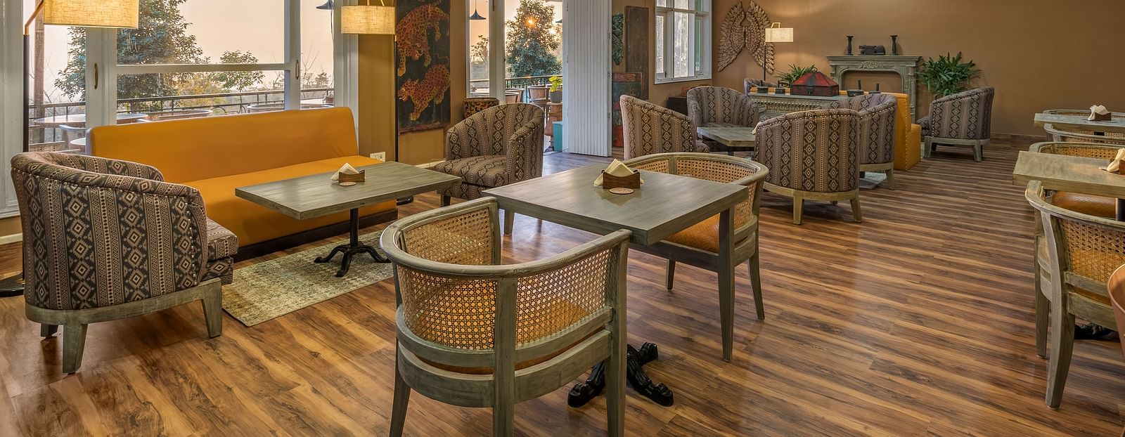 An image of Atman, dharamshala restaurant interior with elegant decor and comfortable seating.