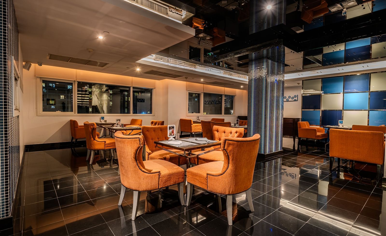 An overview of the seating arrangements inside flava restaurant - Night Hotel Bangkok
