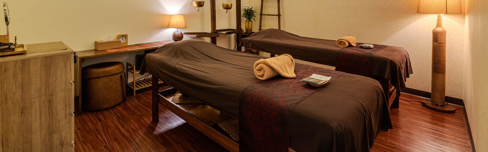 An overview of the massage tables inside Coran Boutique Spa - Night Hotel Bangkok, a Spa Hotel in Bangkok.