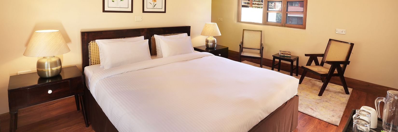 Deluxe Room features soft bedding and contemporary furniture 2 - Lamrin Boutique Cottages Rishikesh