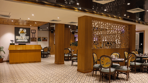 interior and seating arrangements inside The Sunset bar & Restaurant at Rosetum Kasauli