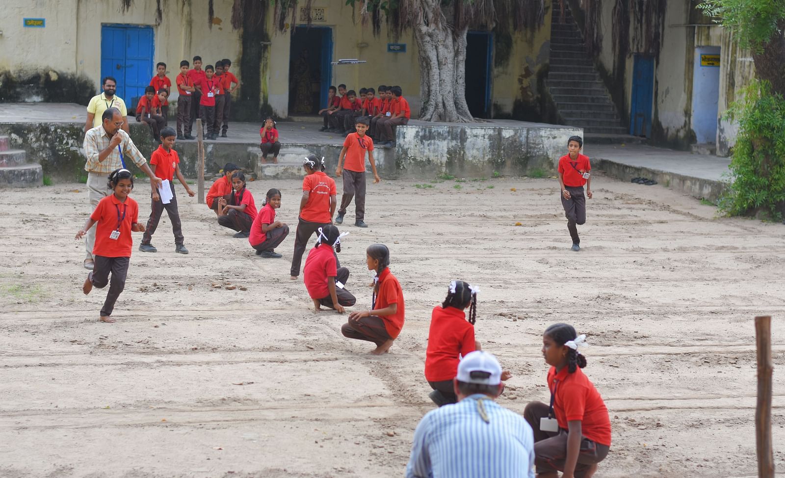 A group of children playing a game- Shahpura Bagh.