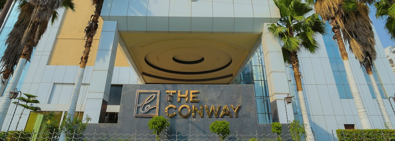 A wide view of The Conway, Meerut's elegant entrance, featuring its distinctive design at The Conway, Meerut.