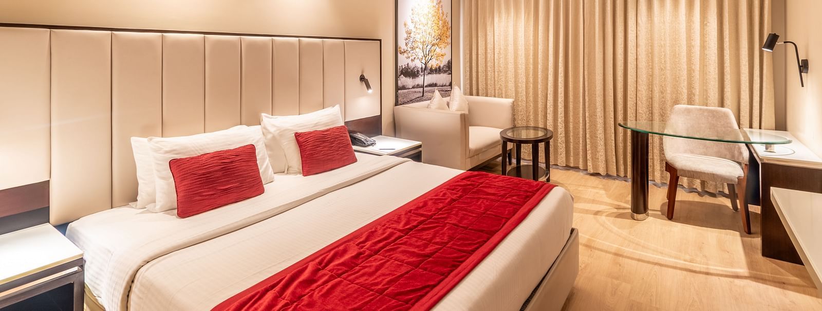 Spacious hotel room with double bed, work desk, and armchair - TGI Grand Fortuna, Krishnagiri Main Road, Hosur