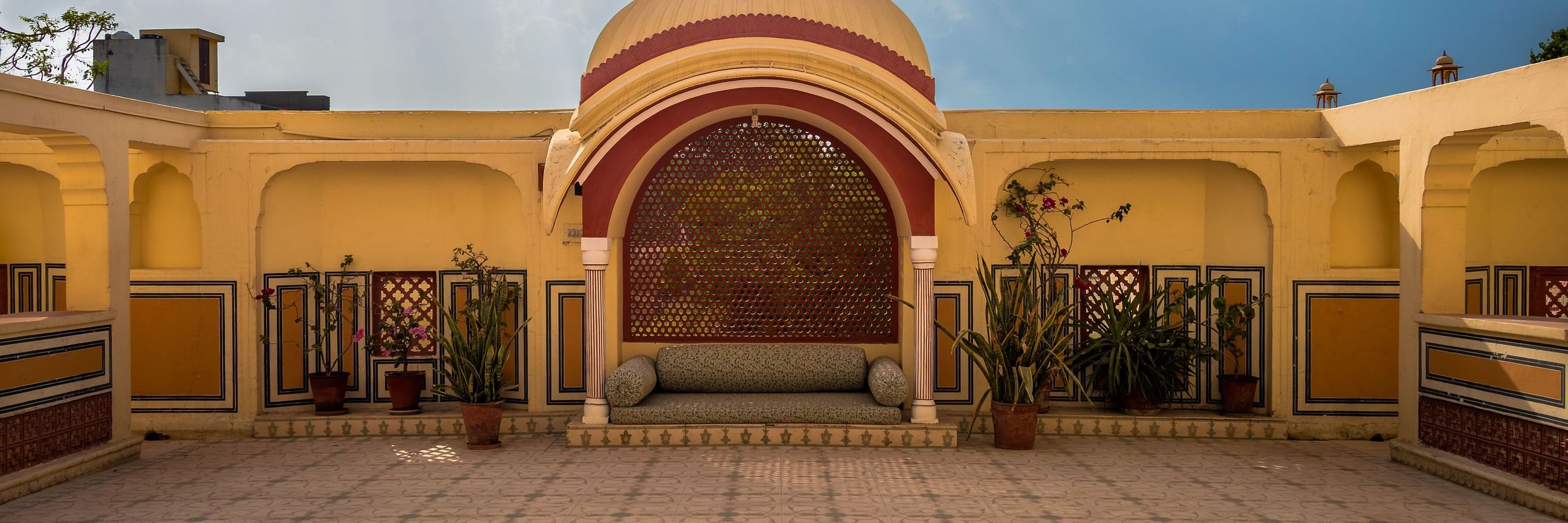 seating arrangement under a canopy with a large open space in front of it - Mandawa Haveli, Jaipur