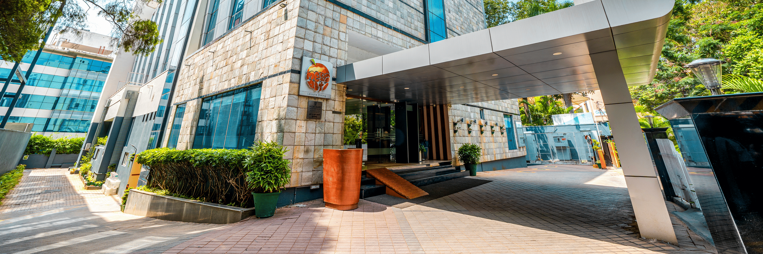 The building with mutliple windows and an entrance. | MGM Mark Whitefield