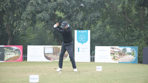 A man playing golf at the golf course on the game day - Heritage Village Resorts & Spa