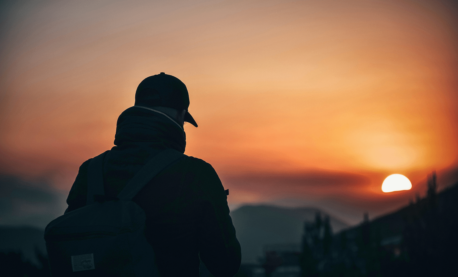 image of a person soaking in the sunset