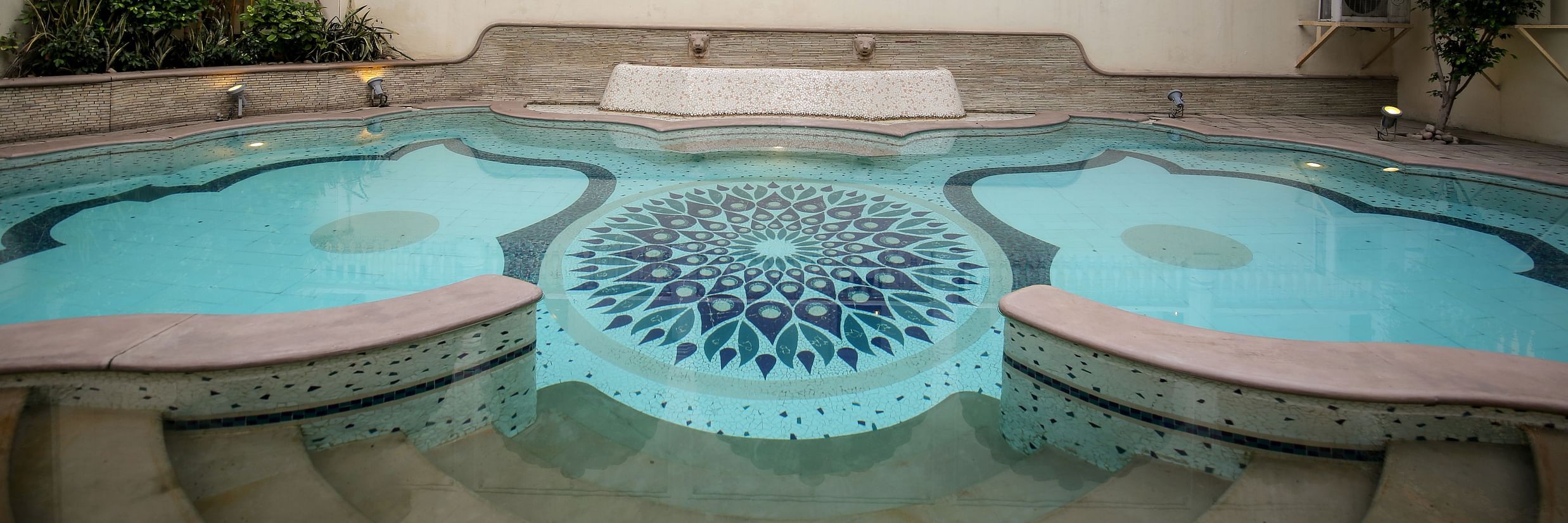 Front view of the swimming pool with the steps leading to it - Mandawa Haveli, Jaipur