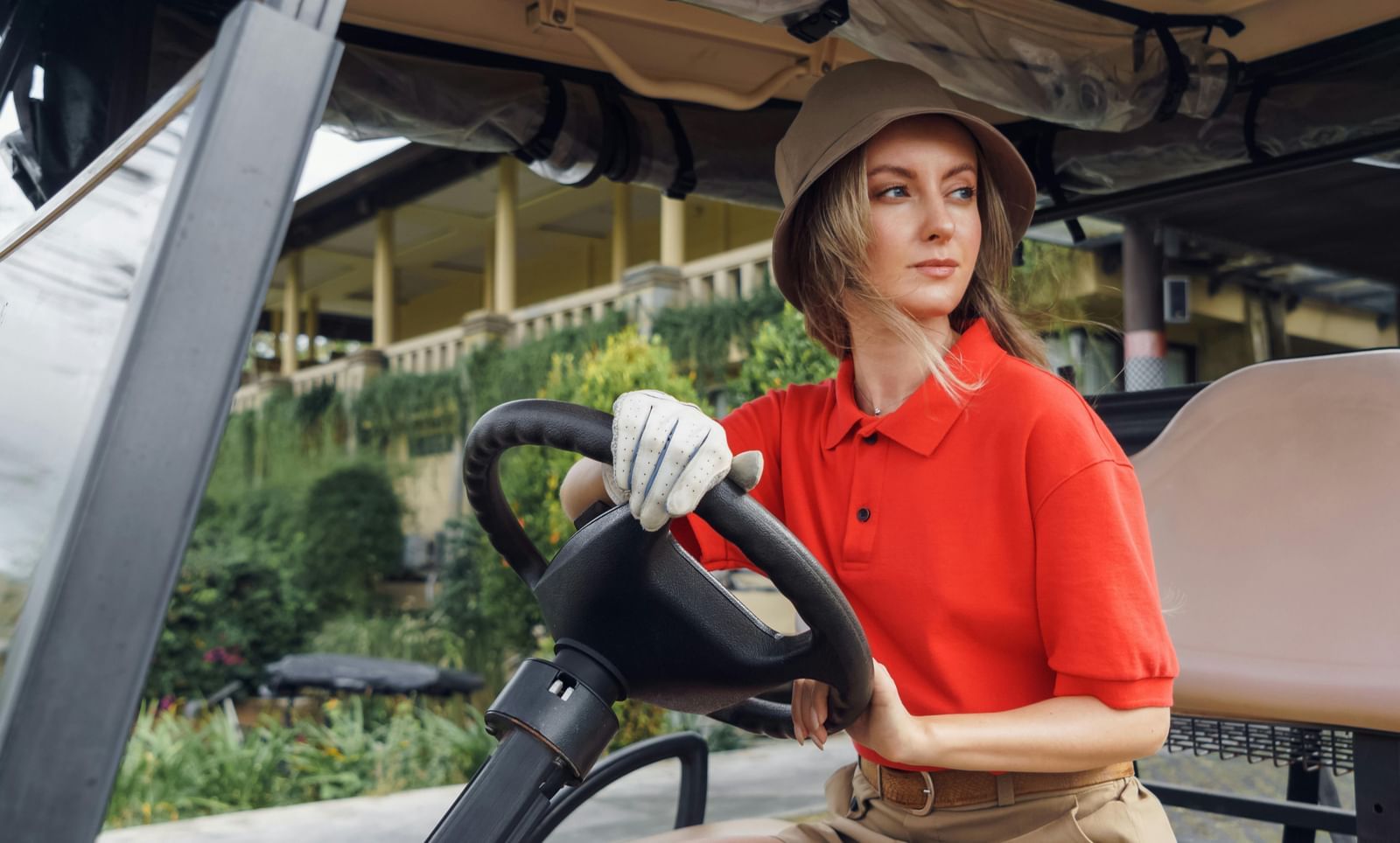 An image of a woman driving a buggy