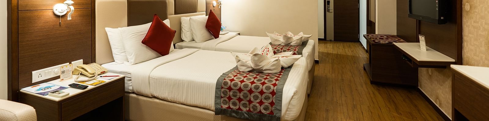 A room with a double bed at Hotel Pai Vista, Mysore