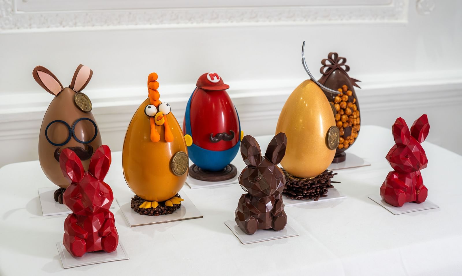 Colorful Easter eggs beautifully arranged on a cloth-covered table, capturing the festive spirit