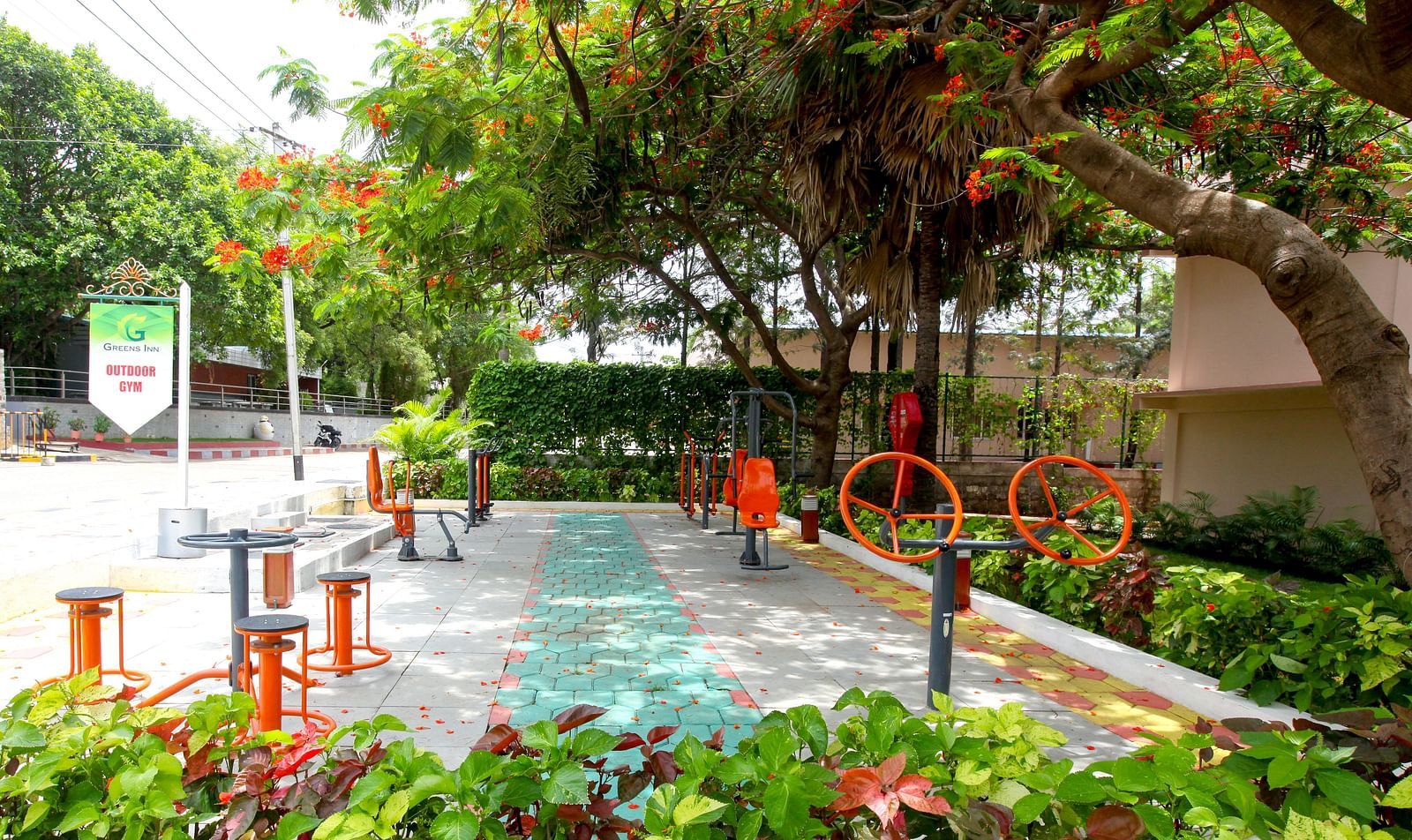 Outdoor games placed under trees at Greens Inn - Fun Activities in Hyderabad.