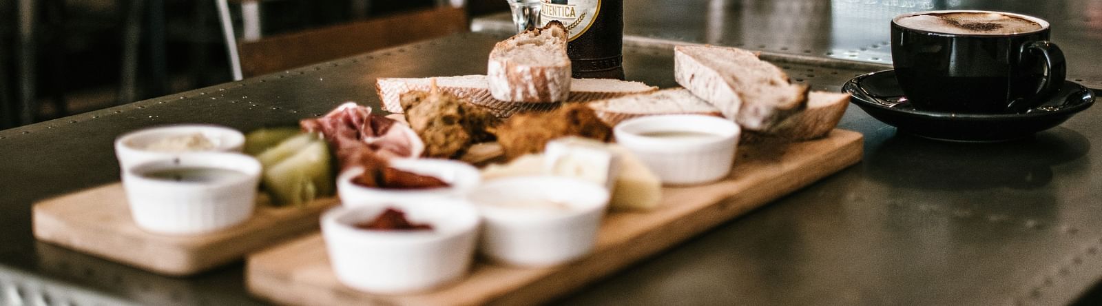 A table in a cafe with breakfast items
